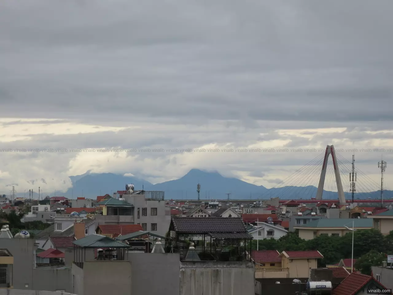 Tam Dao mountain range, Nhat Tan bridge, after the storm, in Hanoi, Vietnam - Vinalib Stock Pictures