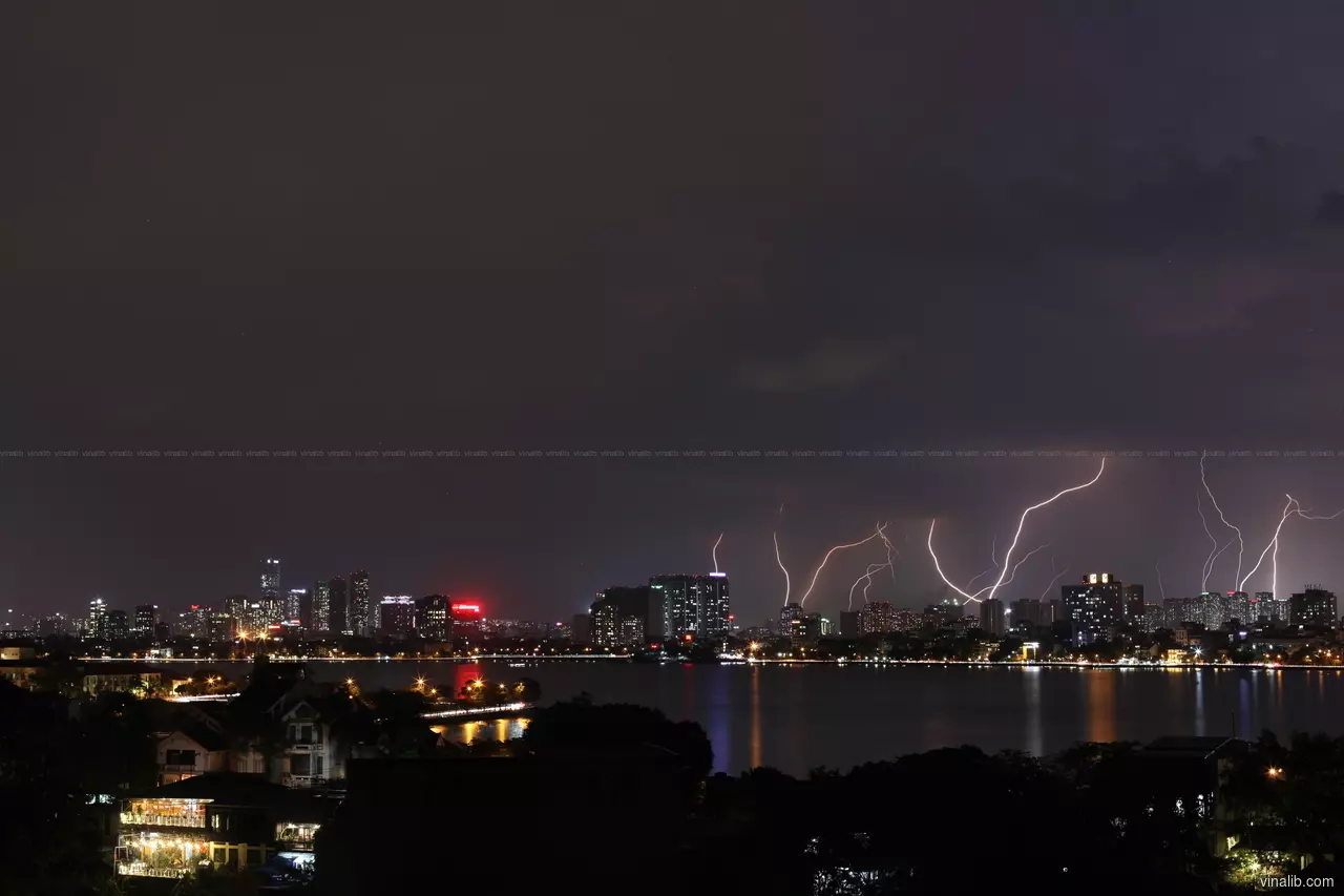 Multiple lightning strikes over West Hanoi suburbs - Vinalib Stock Pictures
