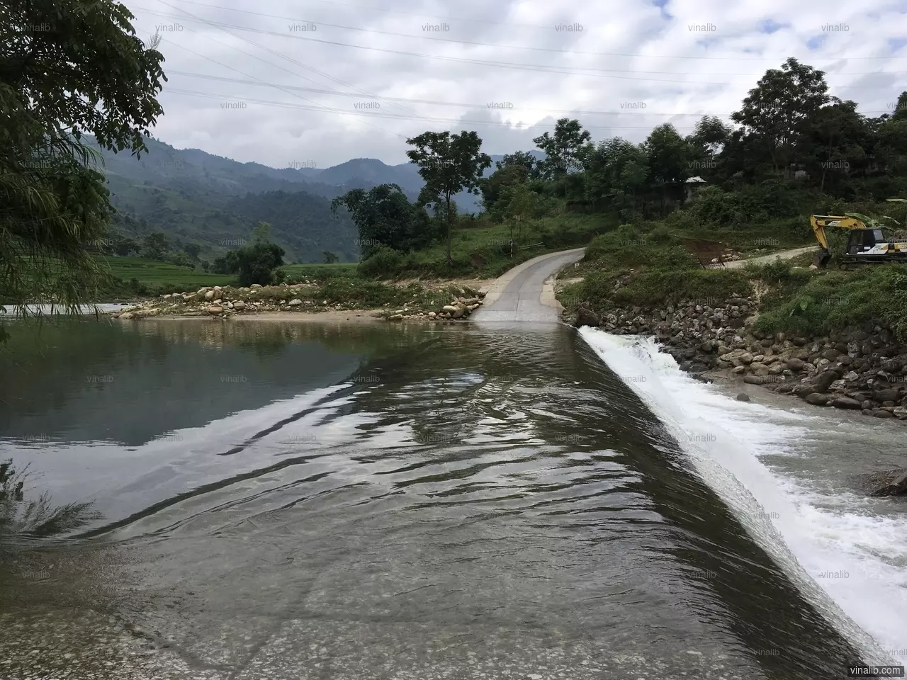 A flooded road in Bat Xat district, Lao Cai province, Vietnam - Vinalib Stock Pictures