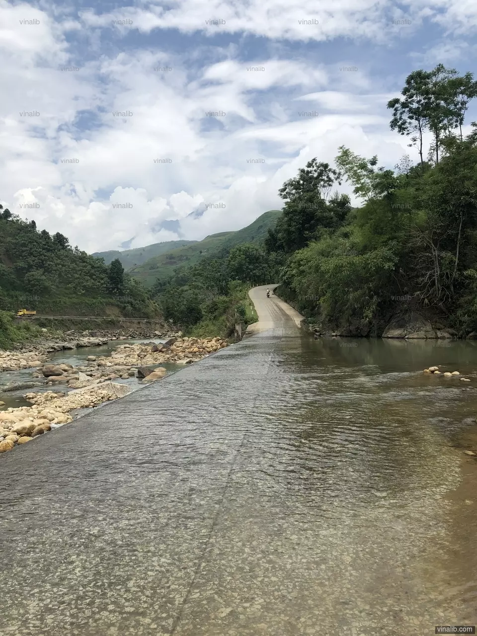 A flooded road in Bat Xat district, Lao Cai province, Vietnam - Vinalib Stock Pictures